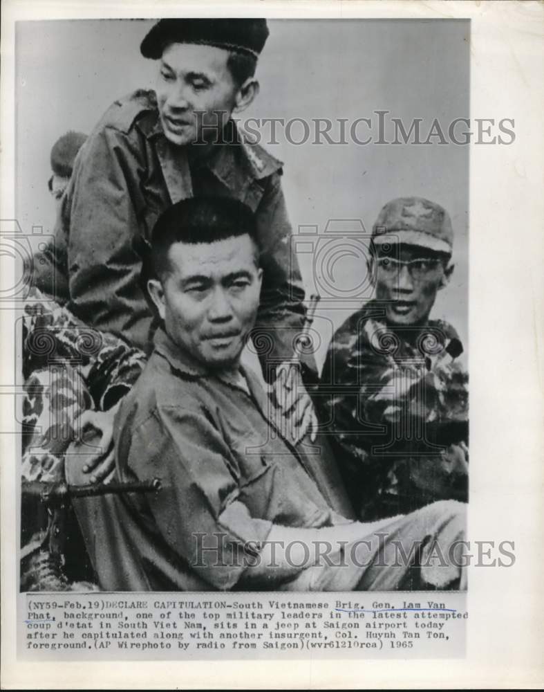 1965 Press Photo Lam Van Phat and Huynh Tan Ton sit in jeep at Saigon airport.- Historic Images