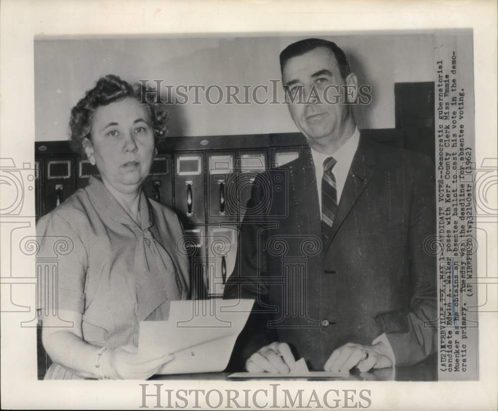 1962 Press Photo Edwin Walker obtains absentee ballot from Emmie Muenker in TX