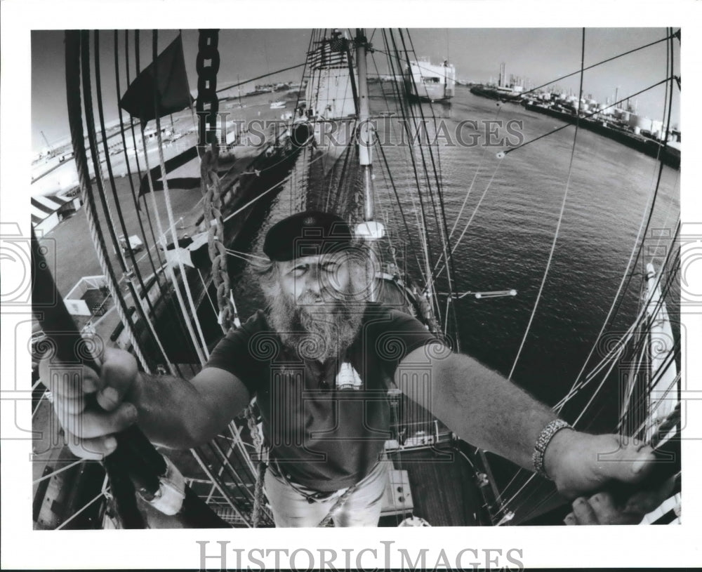 1989 Press Photo Volunteer Randy Movant Pauses at Top of Elissa Tall Ship Mast.