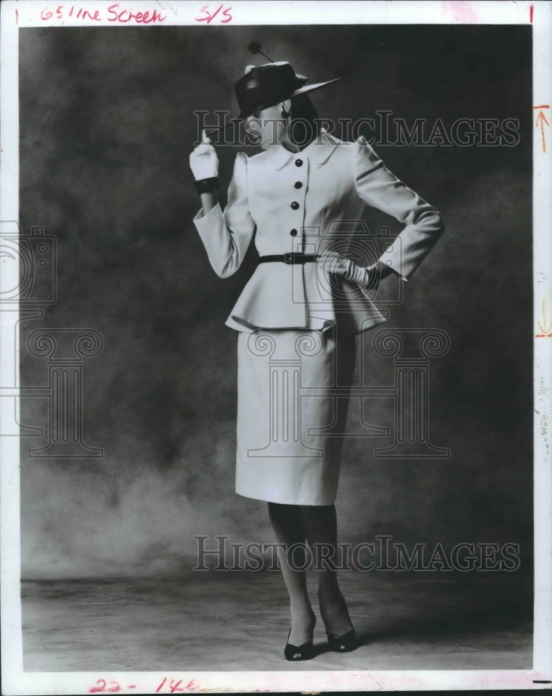 1983 Press Photo Model shows a peplumed jacket, Fashion - hcx03815