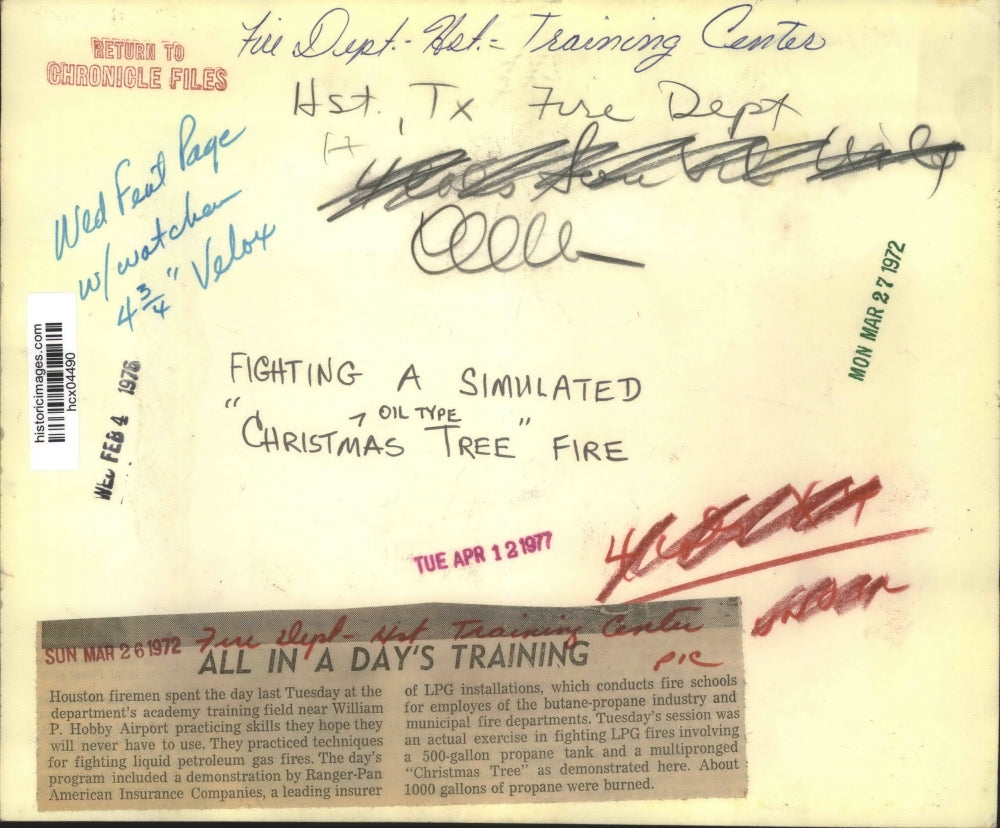 1972 Press Photo Houston fireman spray water on LPG tank at training center