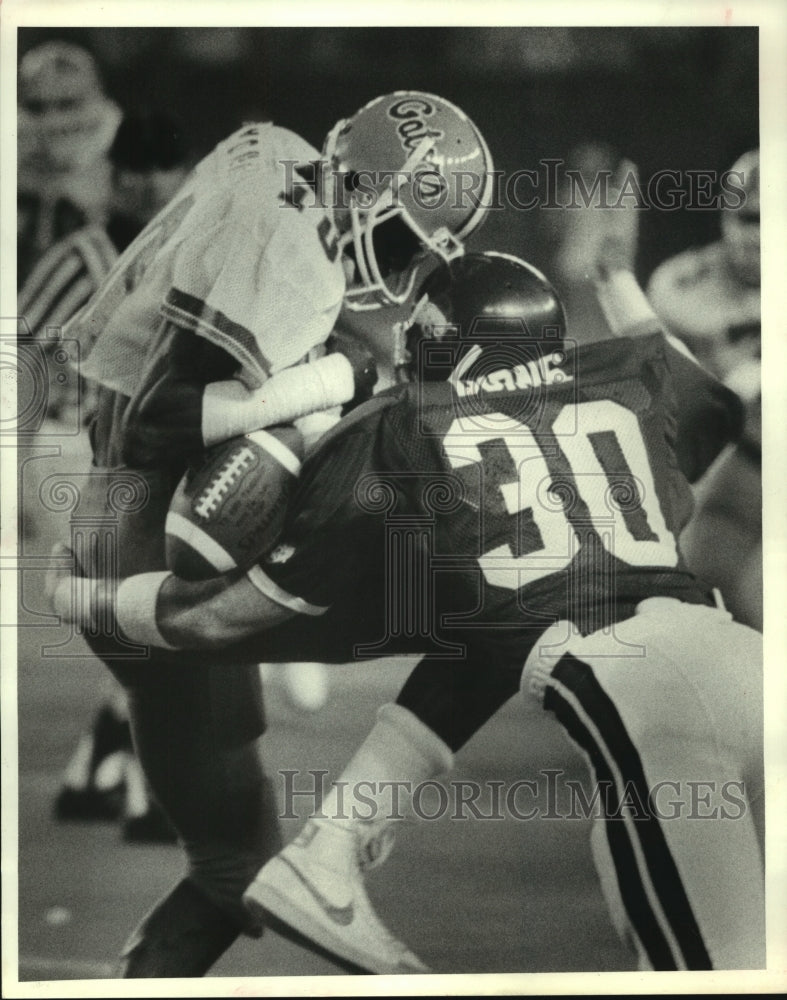 1983 Press Photo Arkansas Football Defensive Back Keith Burns &amp; Tyrone Young.- Historic Images