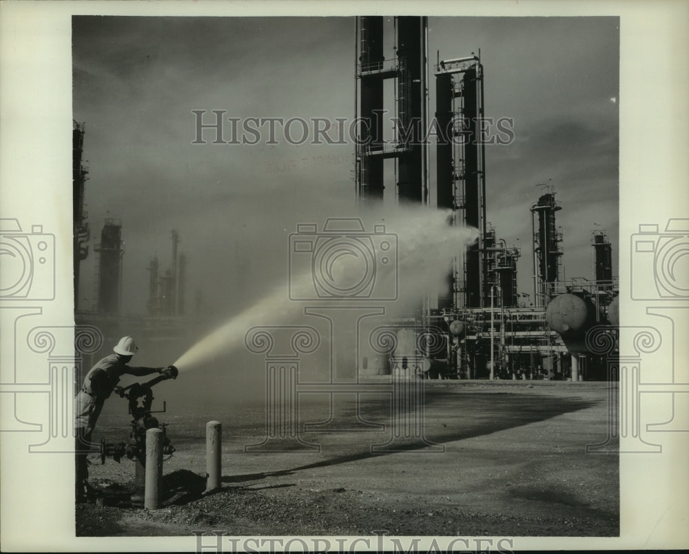 1963 Press Photo Testing Fire Nozzle at Monsanto Chemical Co., Alvin, Texas- Historic Images