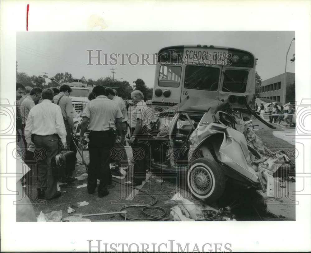 1990 Press Photo Firefighters check car and Alief school bus accident in Houston