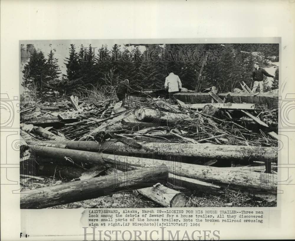 1964 Press Photo Men Look Among Debris For Trailer in Seward, Alaska After Quake