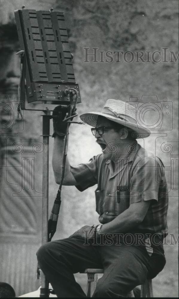 1969 Press Photo Worker yawning on the set of "Viva Max" - hcx26004- Historic Images