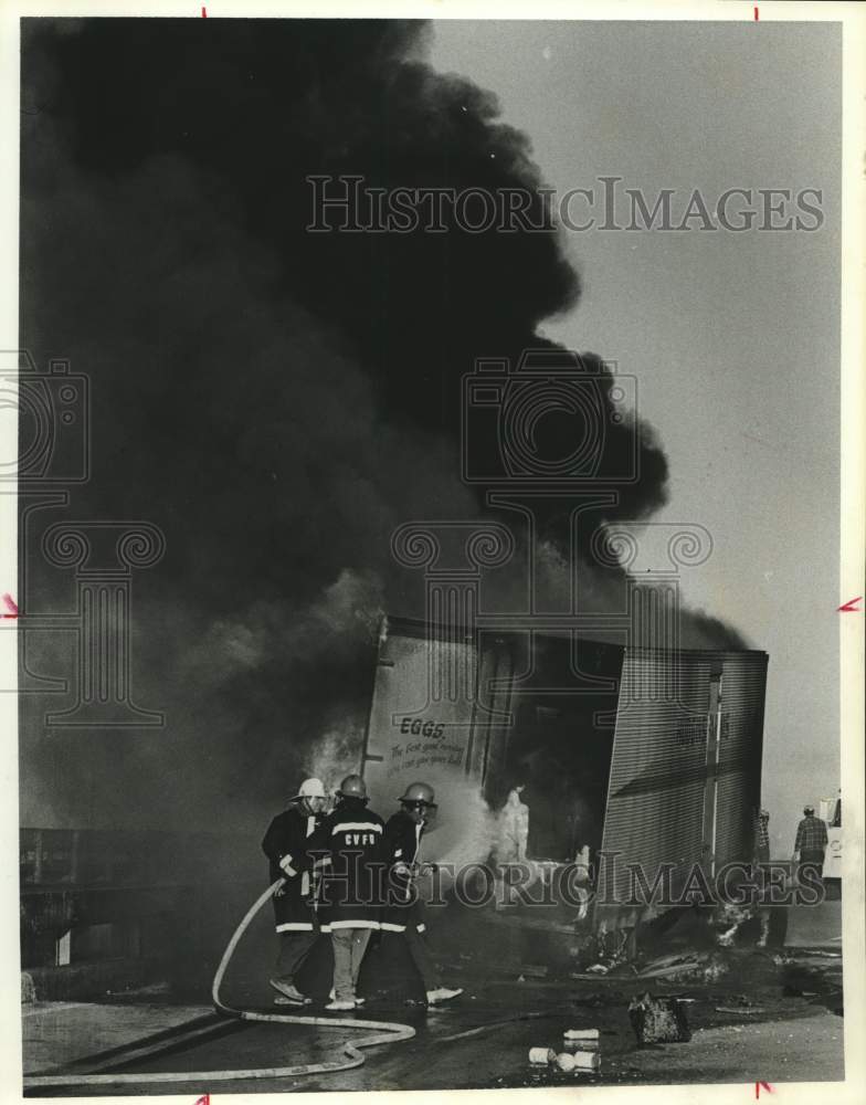 1975 Press Photo Egg truck burns on overpass near Columbus, Texas - hcx33132- Historic Images