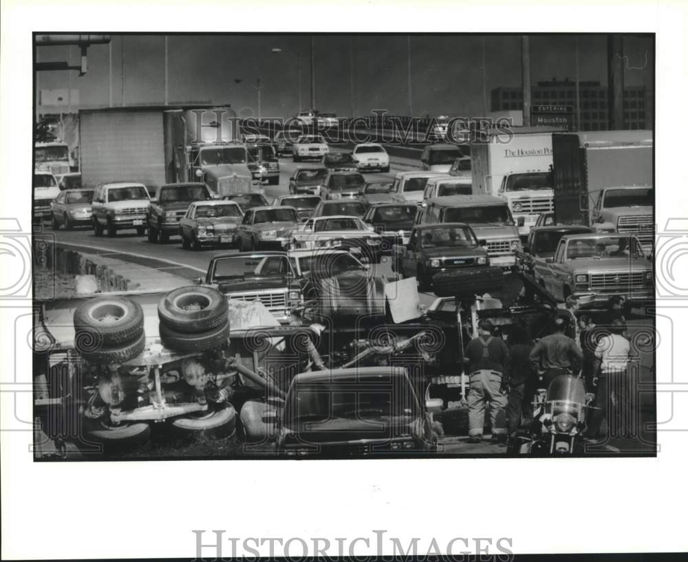1991 Press Photo Overturned Cement Truck Stalls Traffic on Highway 59, Houston- Historic Images