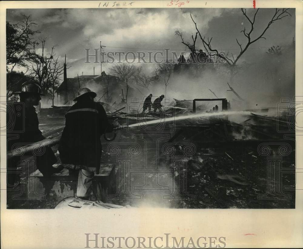 1967 Press Photo Firefighters Battle House Fire at Simpson and Bell, Houston, TX- Historic Images