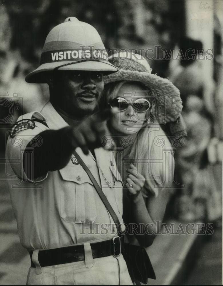 1969 Press Photo Lady Asks Courtesy Corp Questions on Kingston Streets, Jamaica