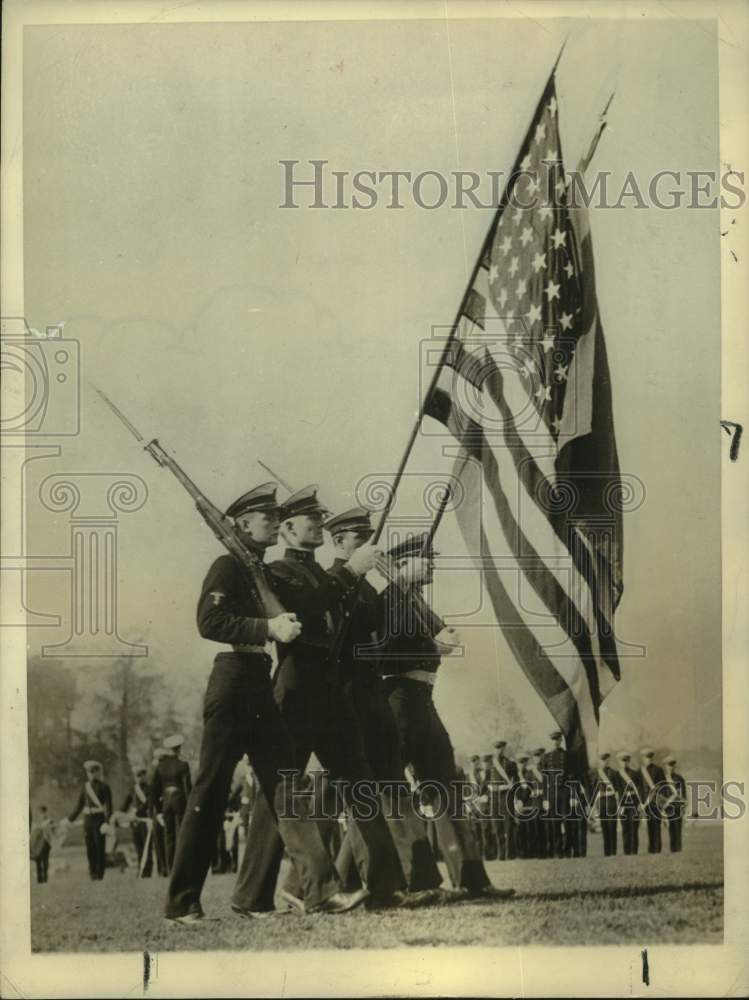 1935 Press Photo Military parade with American flag - hcx42284