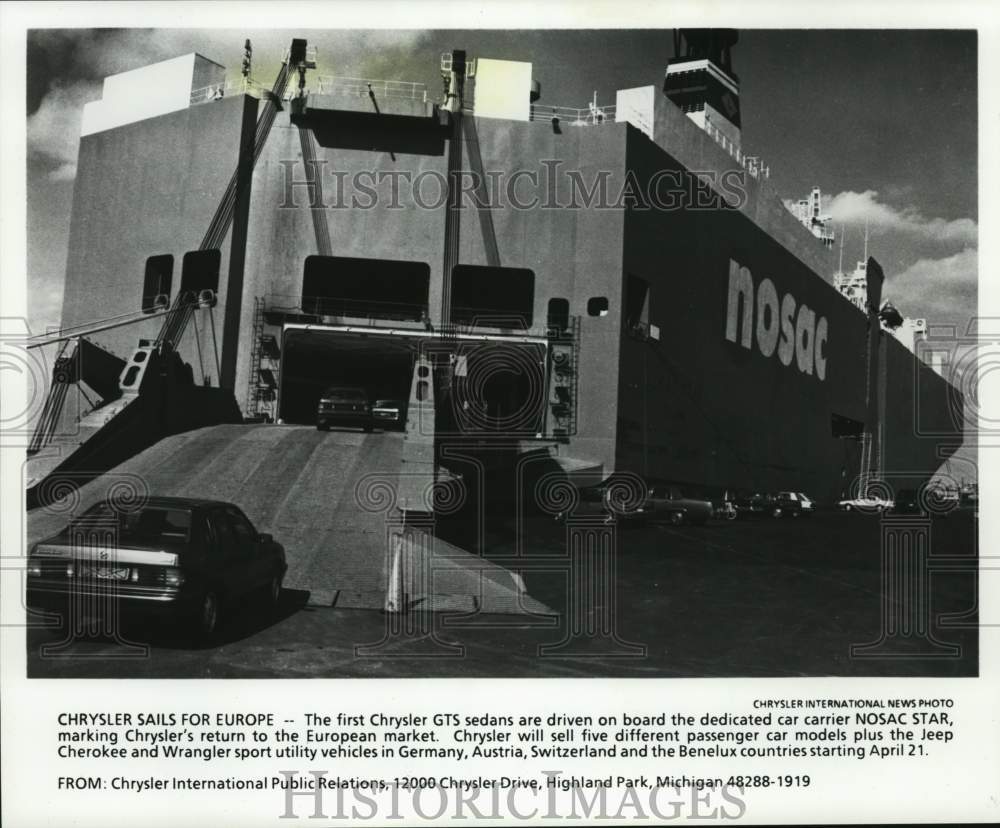 1988 Press Photo Chrysler GTS sedans are driven on board a Europe-bound carrier- Historic Images