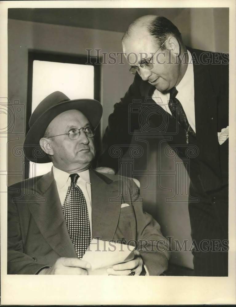 1949 Press Photo P.W. Payne listens to W.P. Haley - hcx50926- Historic Images