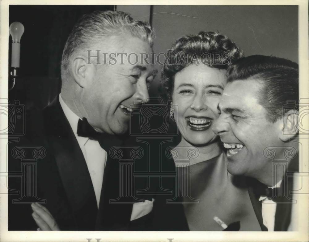 1959 Press Photo Group enjoying good laugh at a party - hcx51554- Historic Images