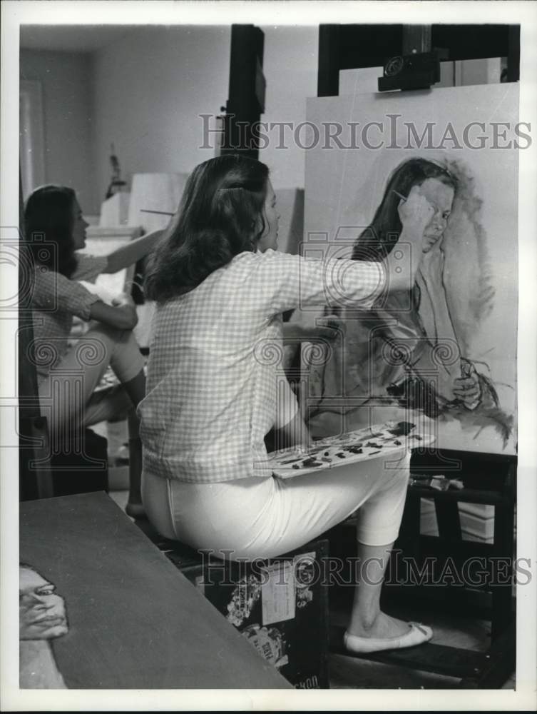 1956 Press Photo Marjorie Steele paints a self-portrait - hcx52583- Historic Images