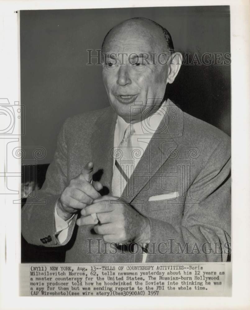 1957 Press Photo Boris Morros discusses his spy work with press in New York- Historic Images