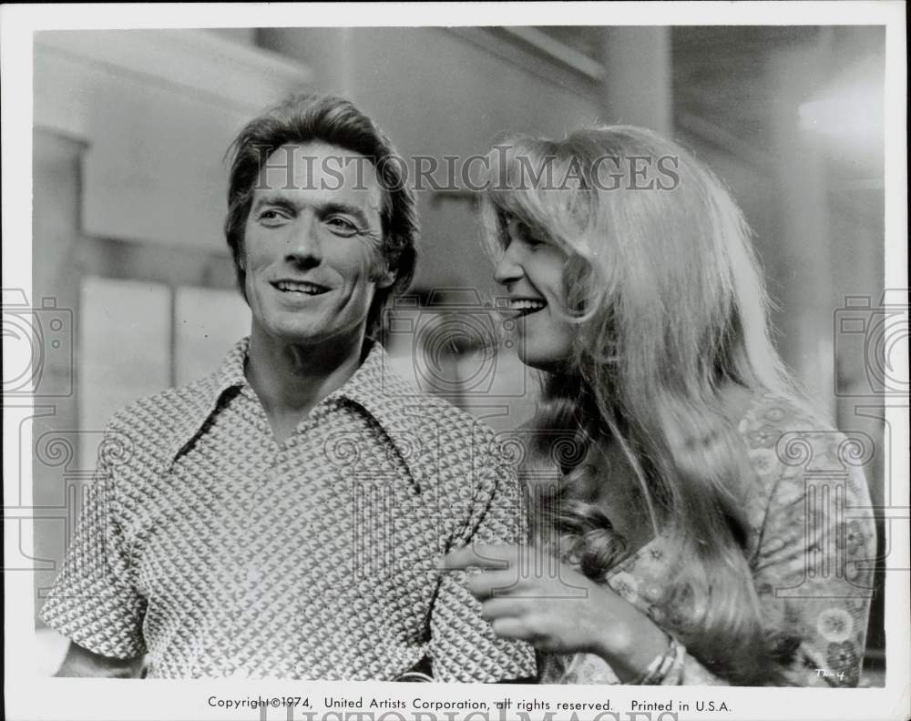 1974 Press Photo Actor Clint Eastwood talks with his co-star - hcx55481- Historic Images