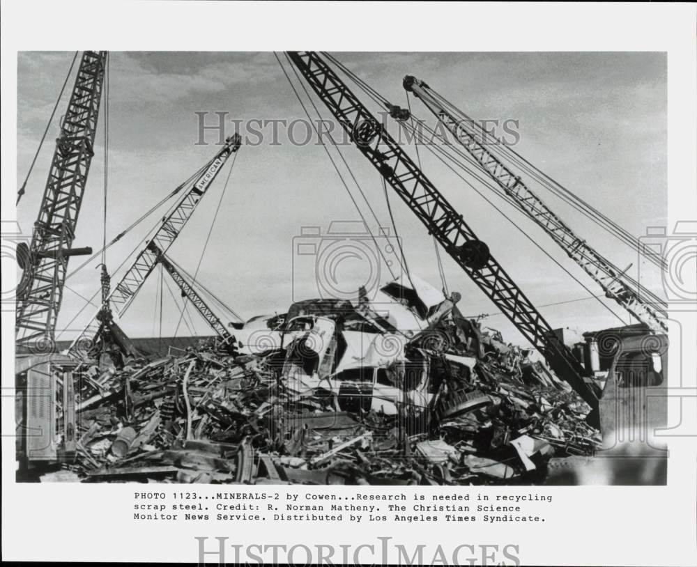 Press Photo Cranes Lifting Cars at Scrap Steel and Metal Recycling Yard- Historic Images