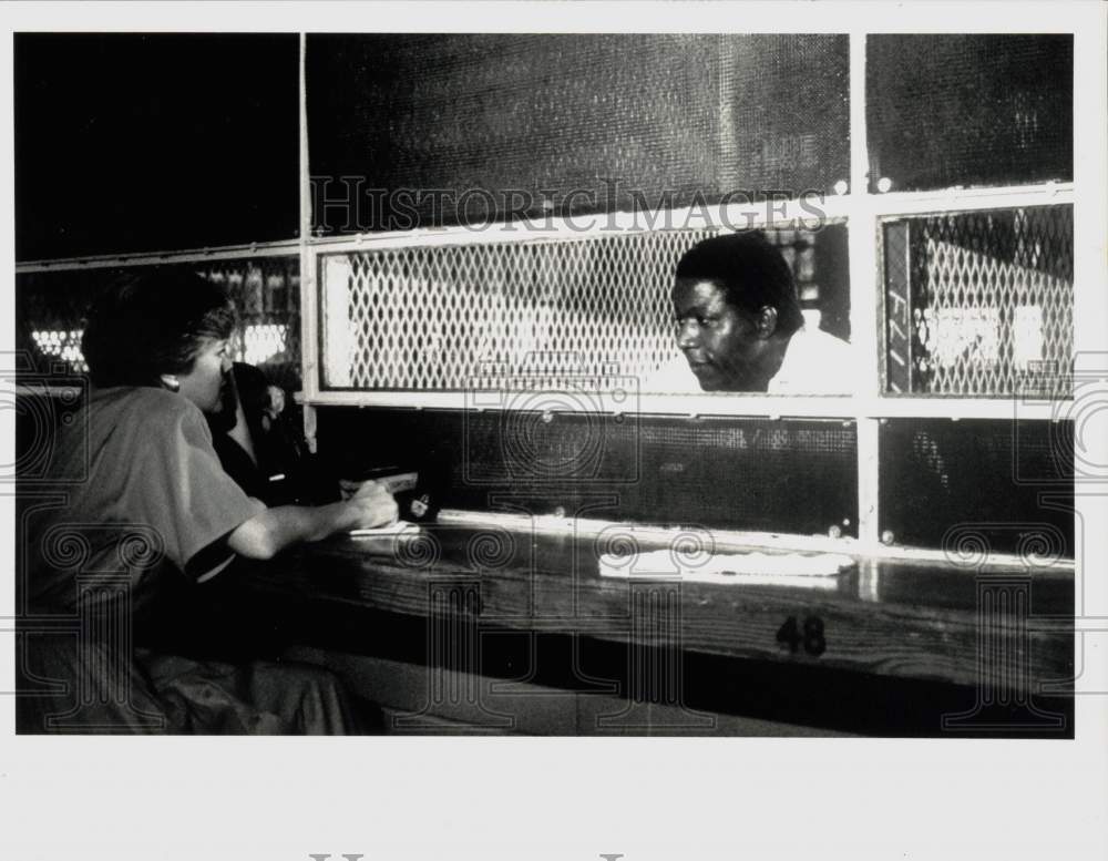 1987 Press Photo Death Row inmate Clarence Brandley talks to a woman - hpa38401- Historic Images