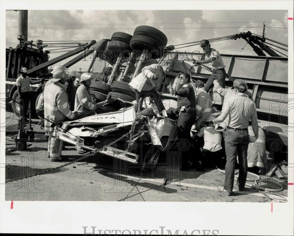 1984 Press Photo Rescuers Work to Free Stephen Douglass from Car after Crash- Historic Images