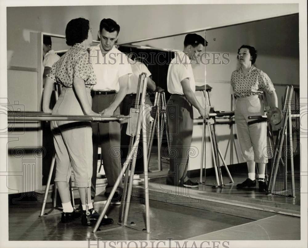 1957 Press Photo Mrs. Cordelia Talley with Physical Therapist L.P. Lanoux, Texas- Historic Images