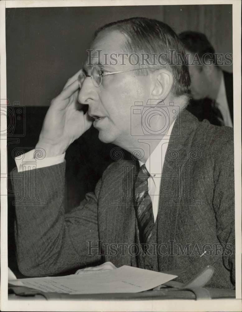 1938 Press Photo Lamont DuPont with hand to his head. - hpa56260- Historic Images