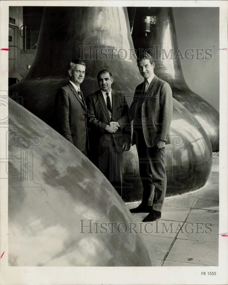 1969 Press Photo Mario Giannone and officials tour Scotland&#39;s White Horse plant.- Historic Images
