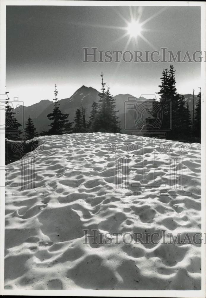 1965 Press Photo Sun shines bright on Washington&#39;s Olympic Park mountain snow.- Historic Images