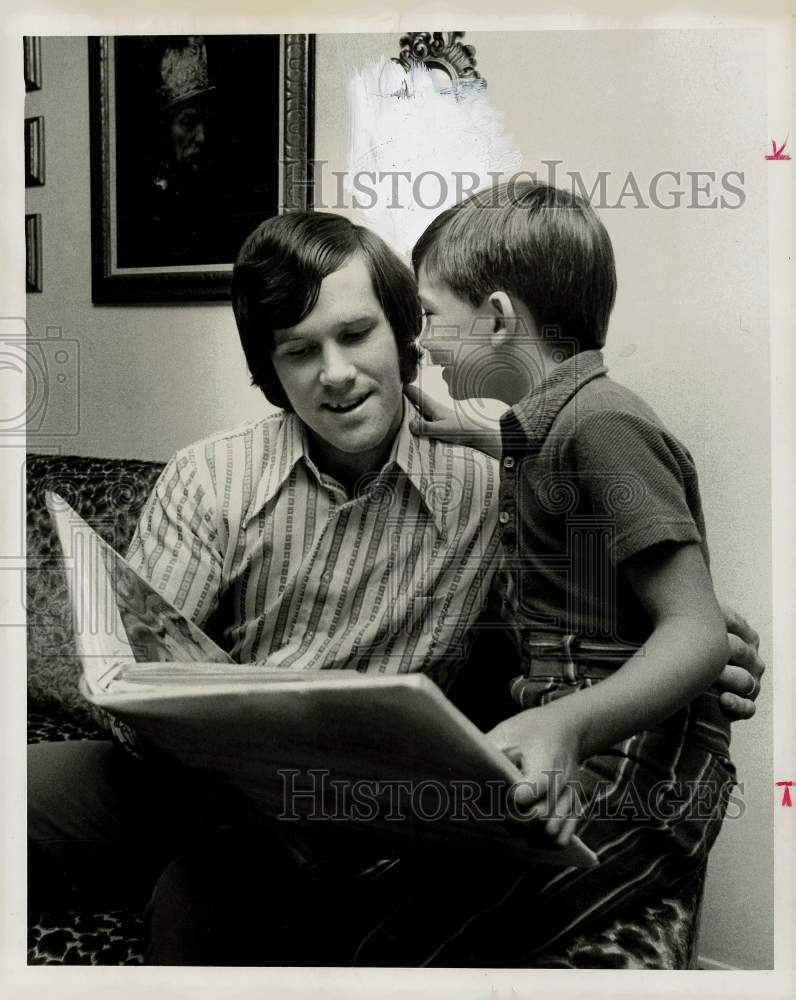 1972 Press Photo John Gough and nephew Douglas look through photo album.- Historic Images