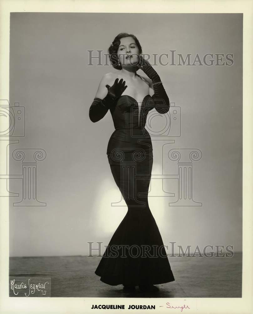 1958 Press Photo Jacqueline Jourdan, singer, shown on stage. - hpa64669- Historic Images