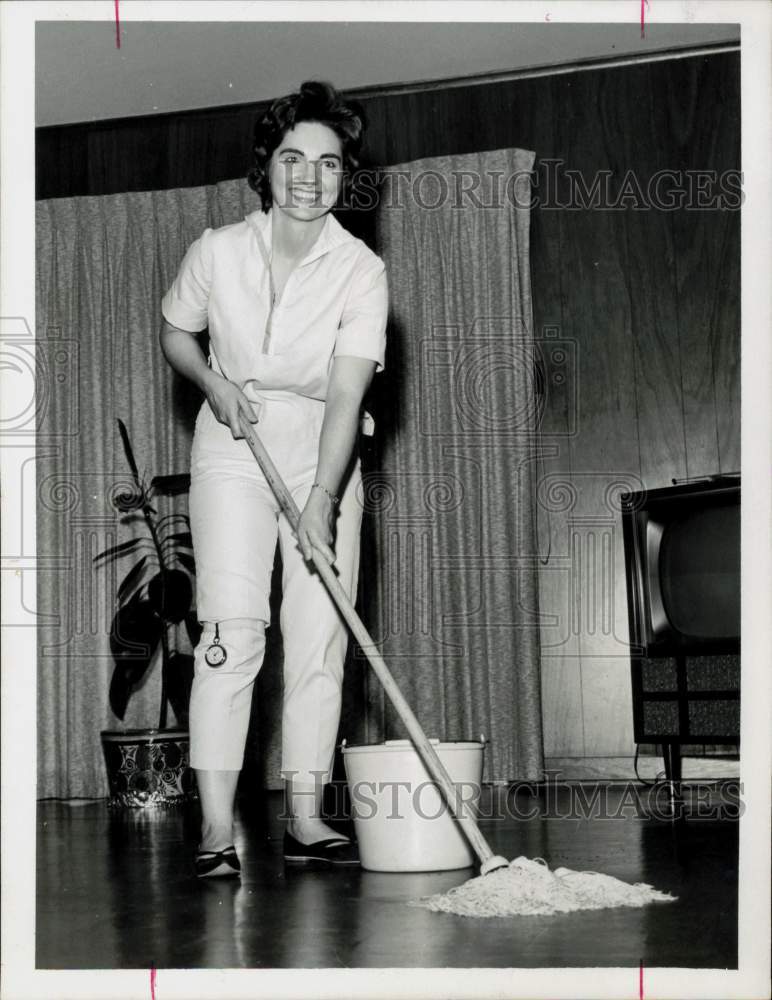 1953 Press Photo Colleen Mayo measures her mopping steps. - hpa68885- Historic Images