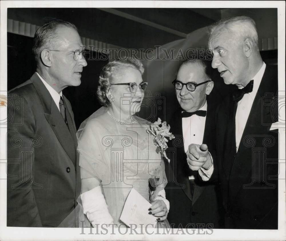 1955 Press Photo Walter Jenkins talks with his wife and friends at a reception- Historic Images