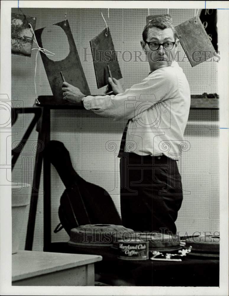 1963 Press Photo Henry Fuloham, percussionist, poses with instruments.- Historic Images