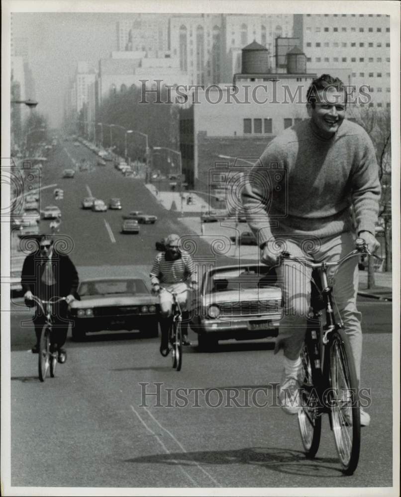 1969 Press Photo Mayor John Lindsay bicycling on New York streets. - hpa75211- Historic Images