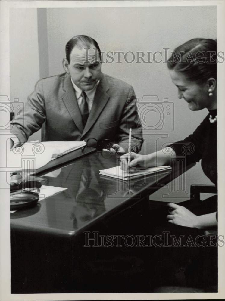 1958 Press Photo John Mulvihill, Houston attorney and secretary work at desk.- Historic Images