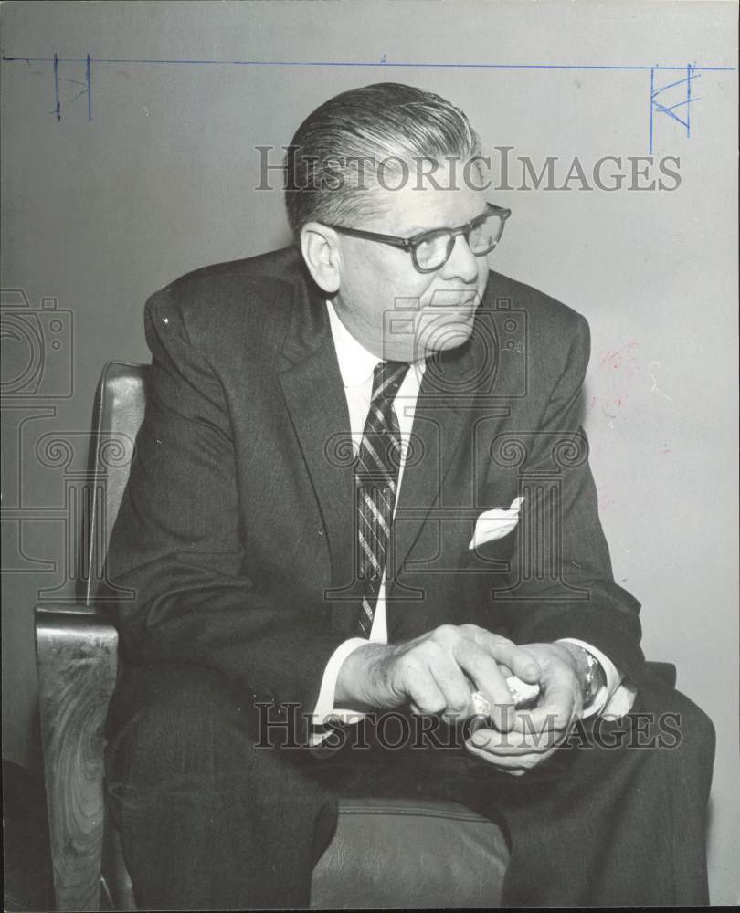 1960 Press Photo James Mitchell, Labor Secretary leans forward while listening.- Historic Images