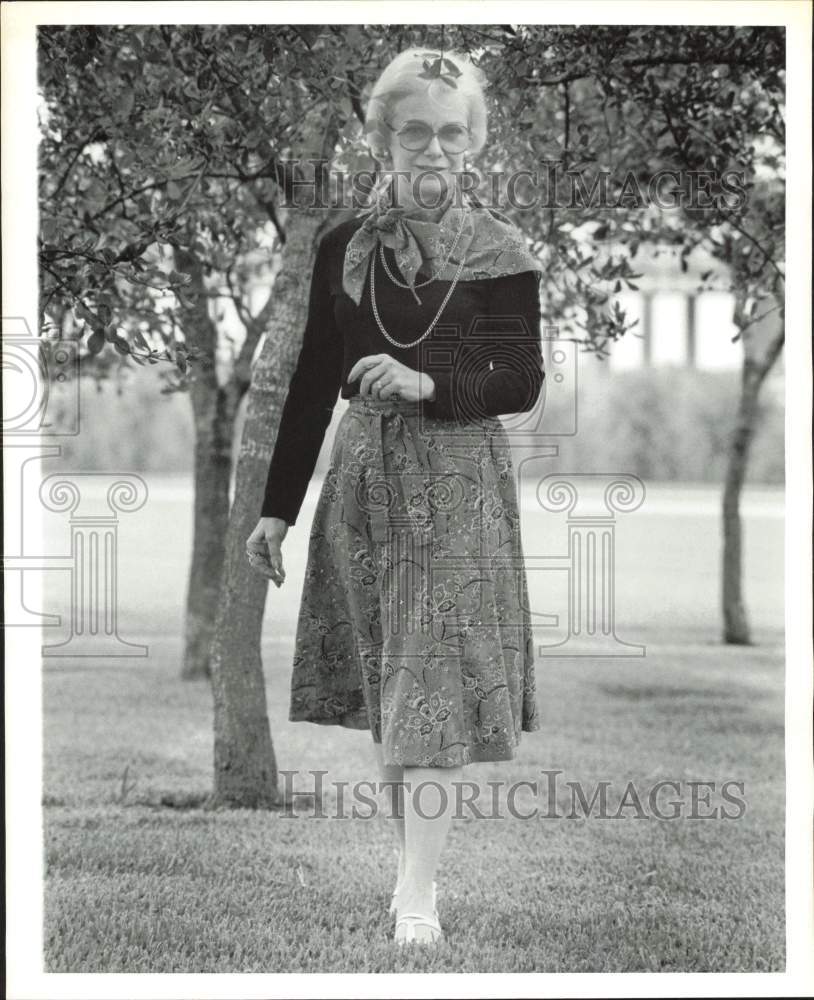 1976 Press Photo Sylvia Wallace, author, walks among trees - hpa79598- Historic Images