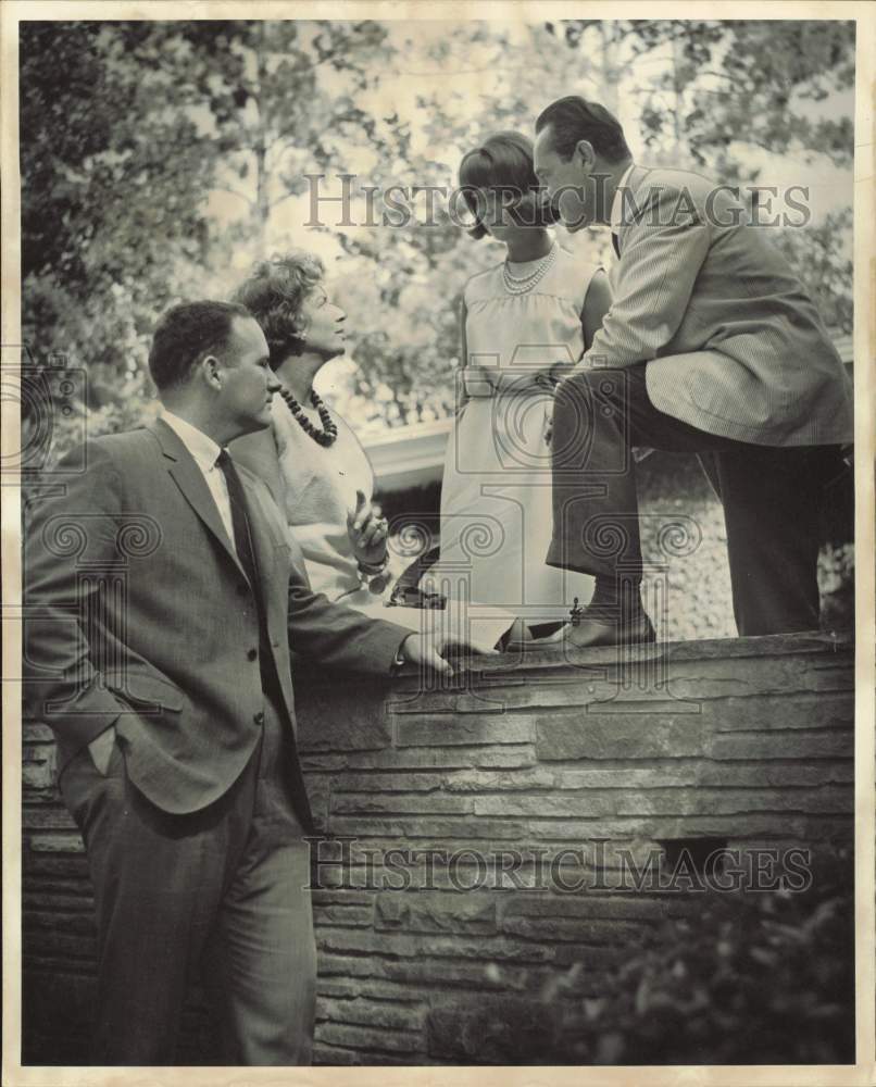 1964 Press Photo Yves Rodrigues, French Consul, talks with Garden Party guests.- Historic Images