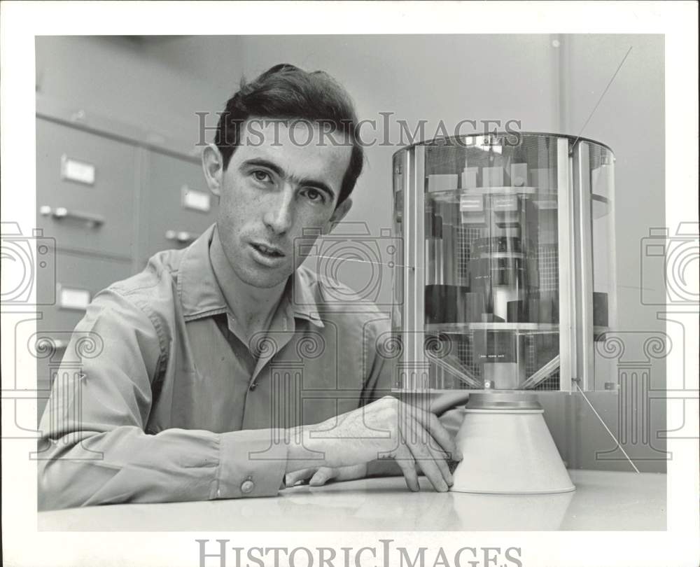 1965 Press Photo Dr. Brian O&#39;Brien shows satellite mockup at Rice University.- Historic Images