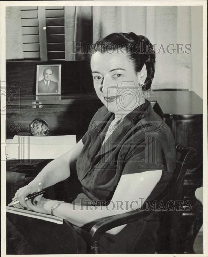 1956 Press Photo Mrs. George E. Peddy sits at desk - hpa80553- Historic Images