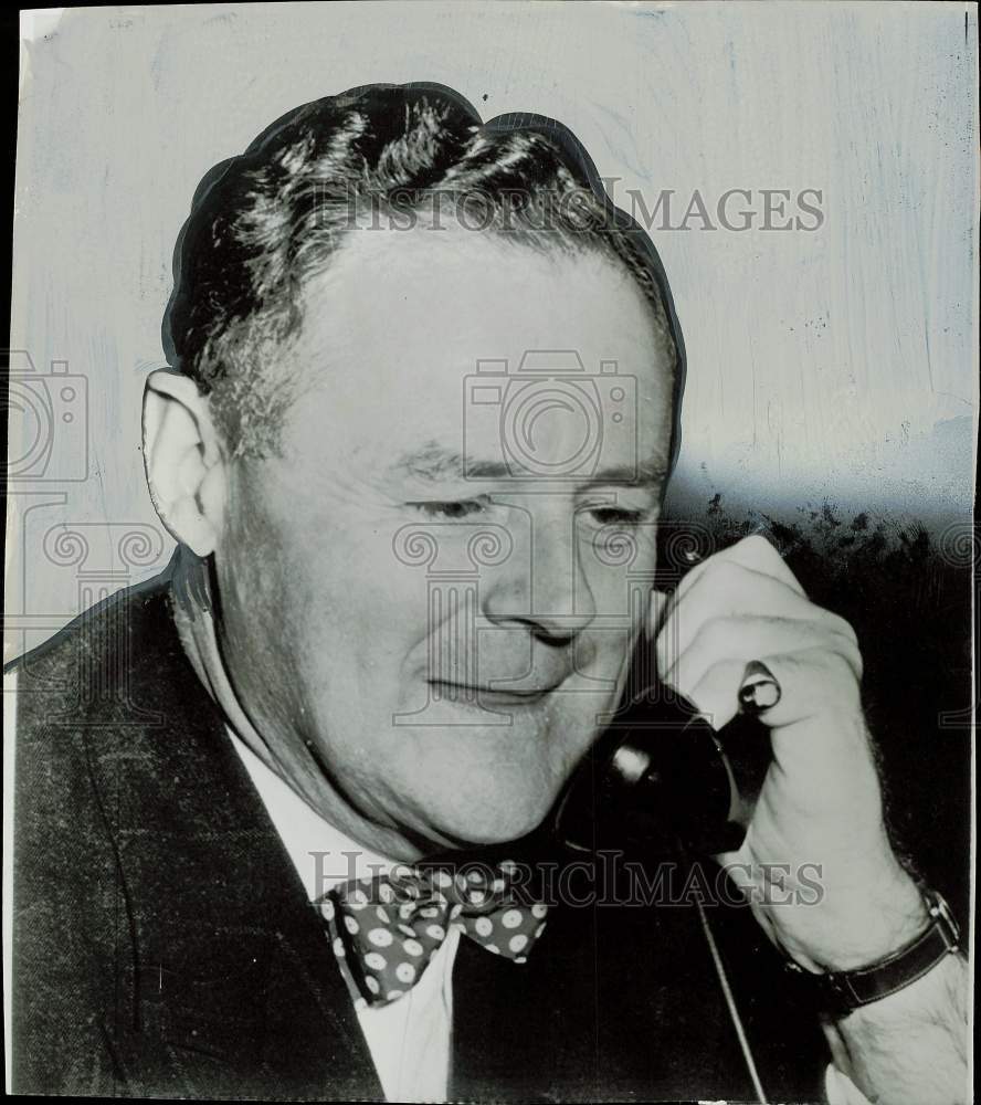 1956 Press Photo Roger Putnam on phone at KPRC-TV - hpa81017- Historic Images