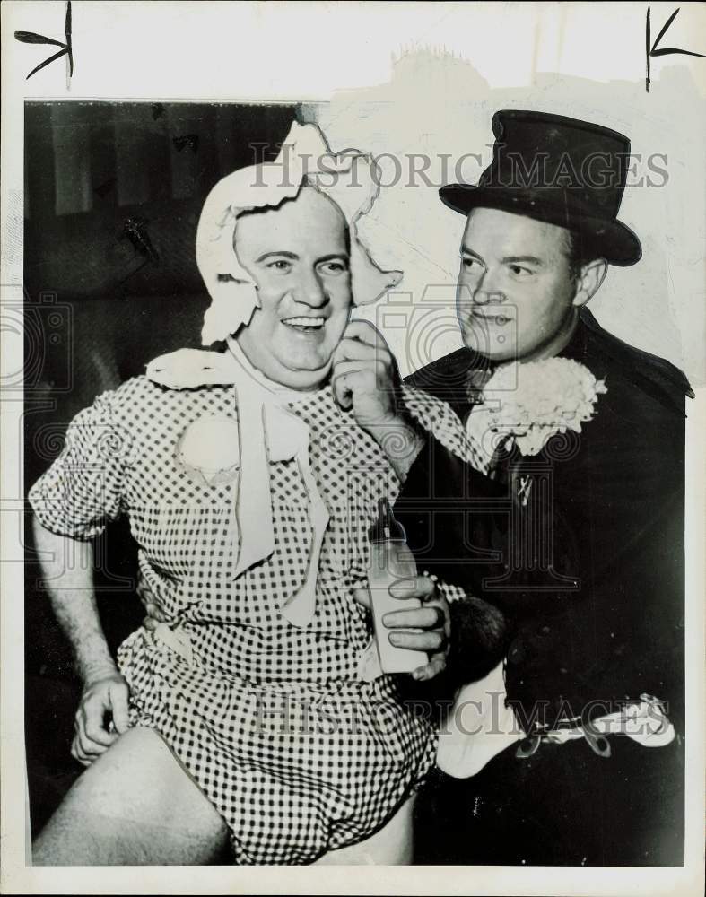 1956 Press Photo Johnny Meyer, in romper, with Bob Hope at New York ball.- Historic Images