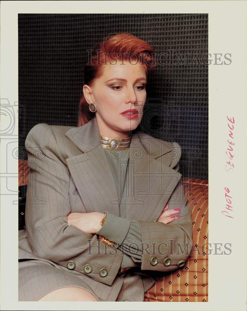 1989 Press Photo Georgette Mosbacher sits with arms folded at Ritz Carlton.- Historic Images