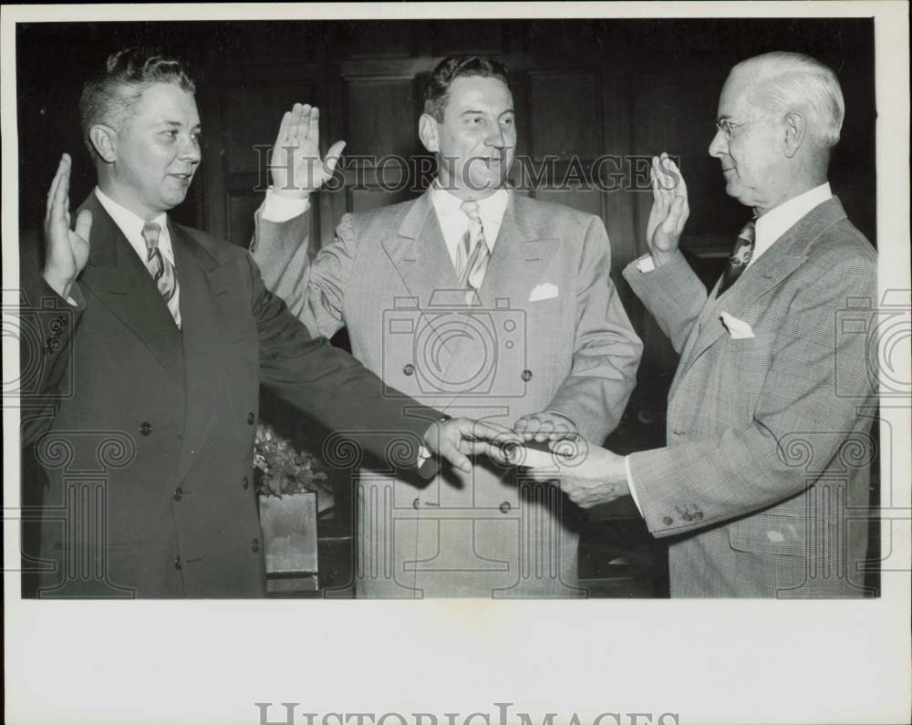 1950 Press Photo Donald Nyrop and Delos Rentzel swearing-in re-enactment.- Historic Images