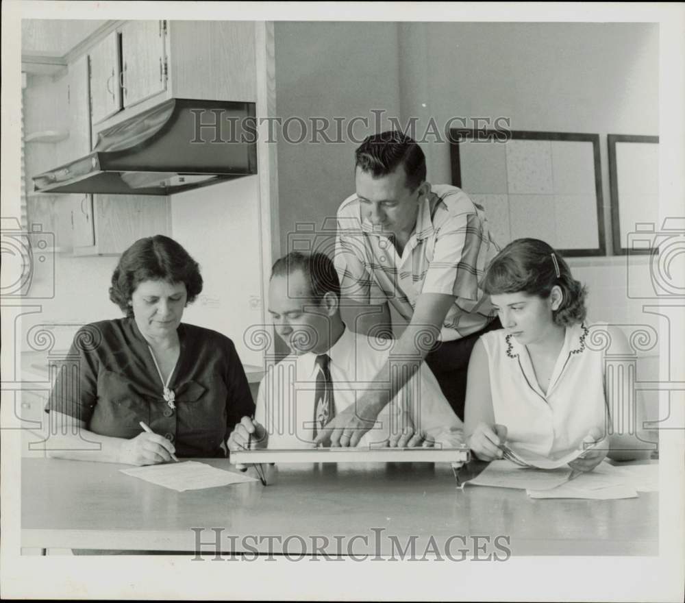 1959 Press Photo Jim Sexton and officials sign contract for kitchen cabinets.- Historic Images