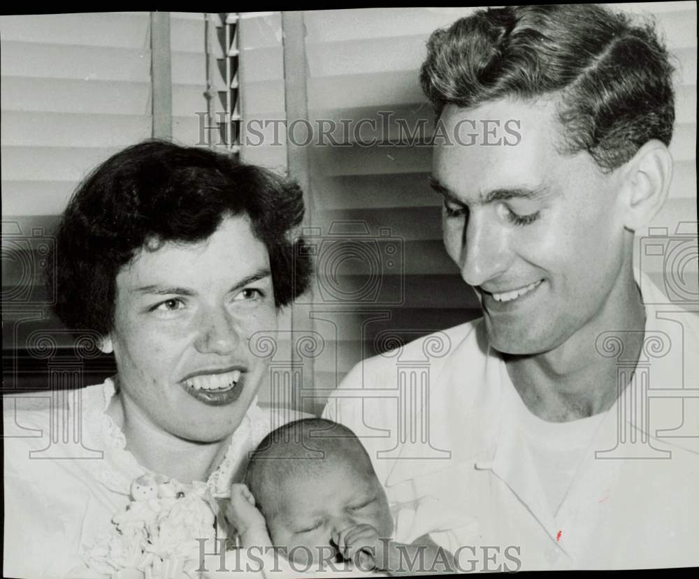 1955 Press Photo Mr. and Mrs. George Wharton hold their baby in Beaumont.- Historic Images