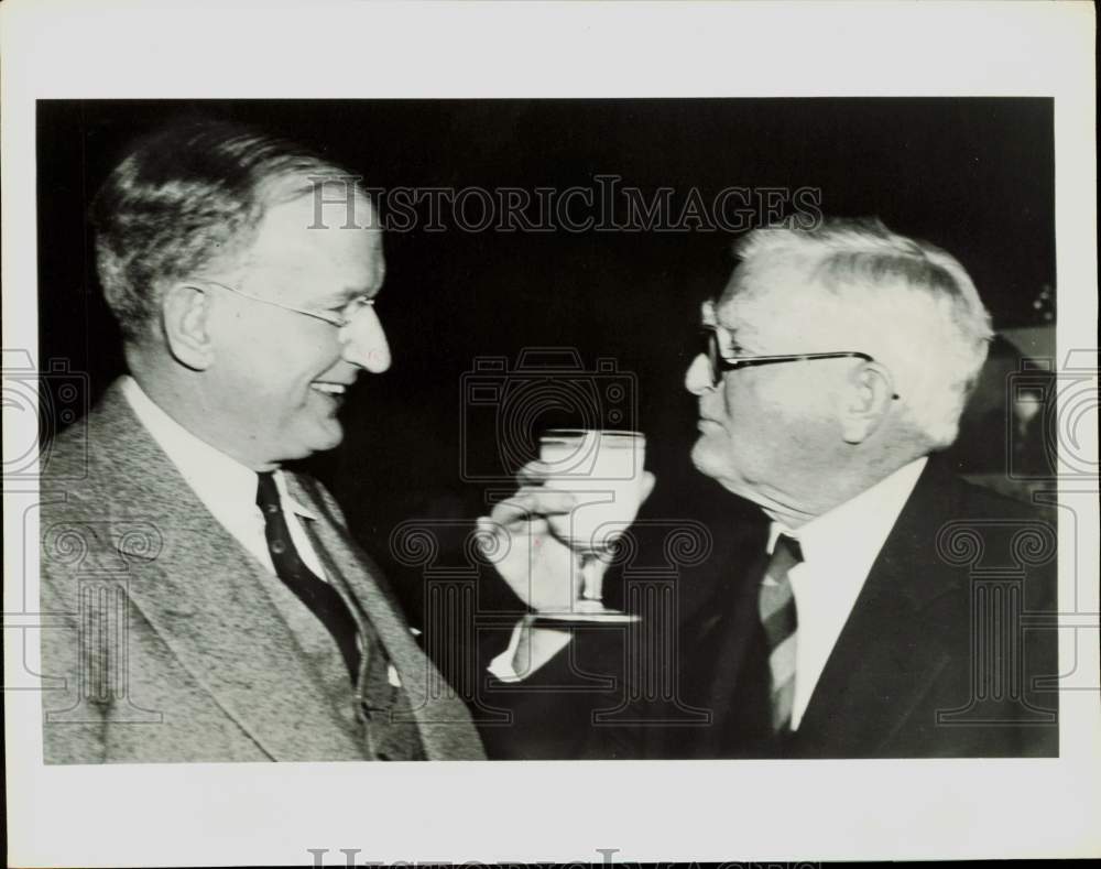 1962 Press Photo Burton Wheeler and John Garner shown during toast. - hpa83590- Historic Images