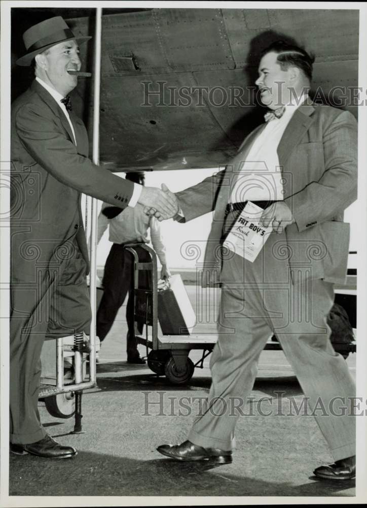 1955 Press Photo Author Elmer Wheeler greets friend. - hpa83889- Historic Images