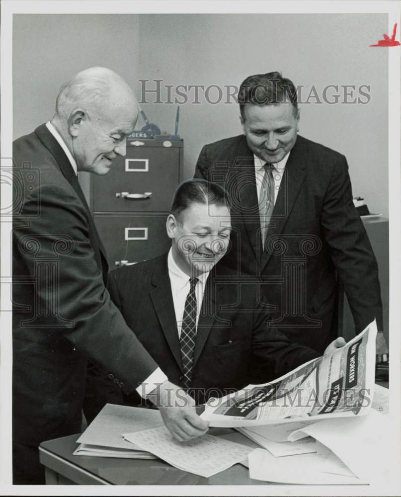 1960 Press Photo Hugh McKenna and other Social Security officials view document.- Historic Images