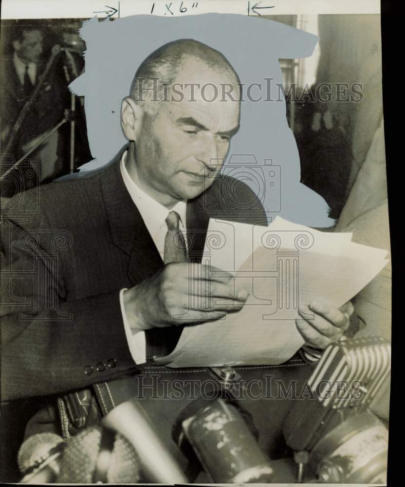 1953 Press Photo Dr. Marek Korowez looks through papers. - hpa84372- Historic Images